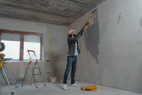 Guy doing Wall Painting